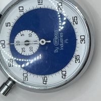Cronómetro mecánico de mano vintage de la marca Compass Industries.